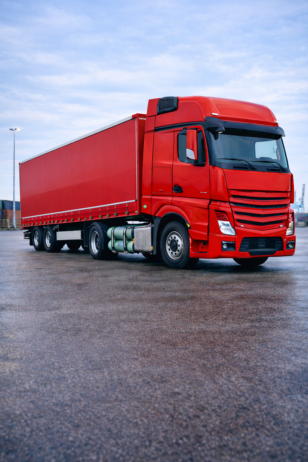 Heavy-duty truck converted to CNG fuel system with integrated gas cylinders, engineered by AB X Machina for industrial and transport applications